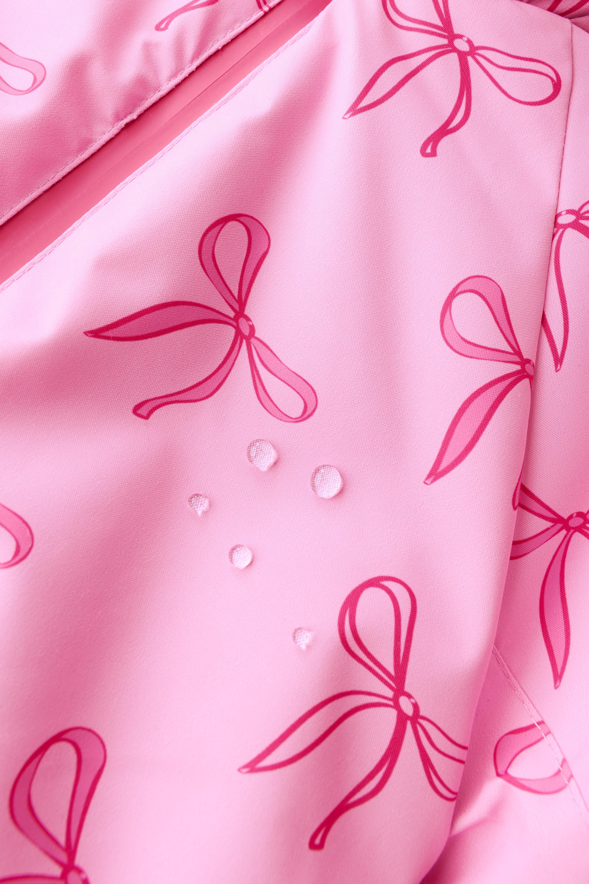 COMBINAISON LONGUE DÉPERLANTE ET COUPE-VENT À LACETS